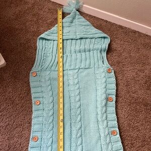 Blue knit blanket sack with hood